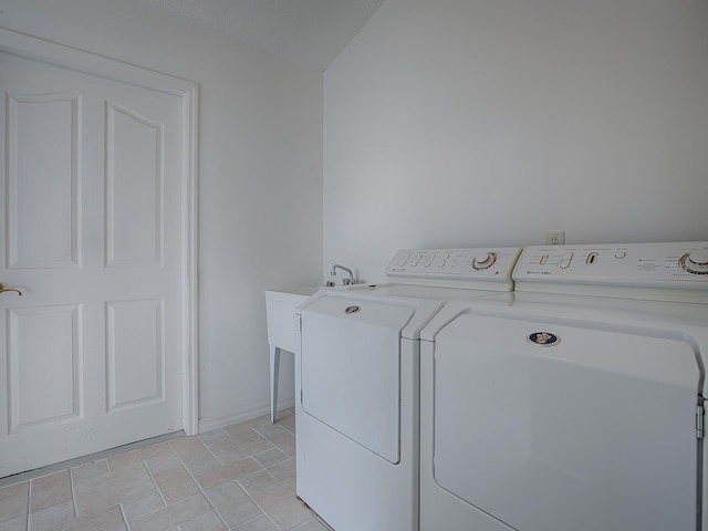 laundry room with washer and clothes dryer