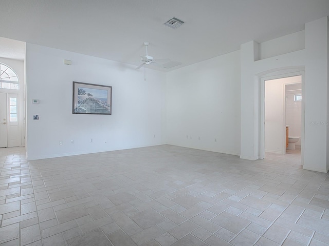 unfurnished room featuring ceiling fan