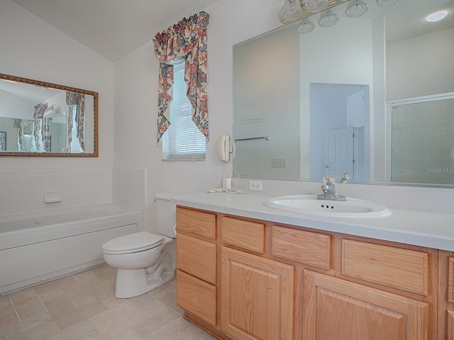 bathroom featuring a tub to relax in, a textured ceiling, vaulted ceiling, toilet, and vanity