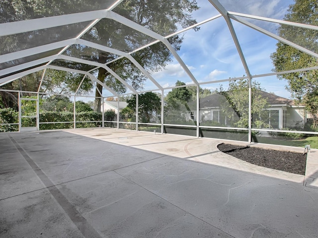 view of patio with a lanai