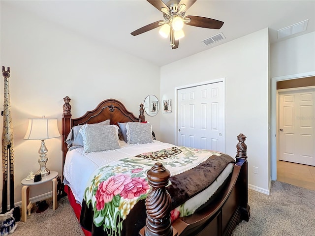 bedroom featuring ceiling fan, carpet, visible vents, and baseboards