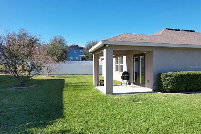 exterior space with a patio and fence