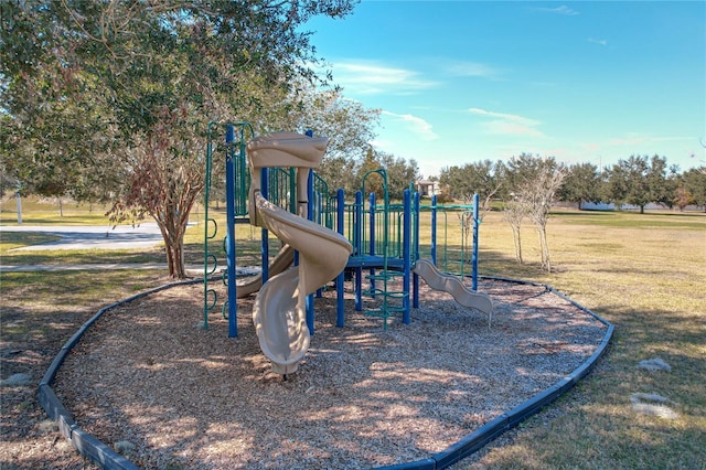 community play area featuring a lawn