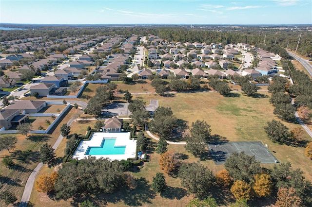 birds eye view of property with a residential view