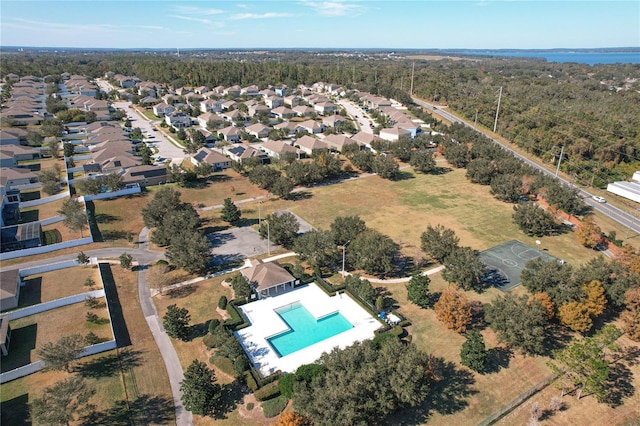 birds eye view of property with a residential view