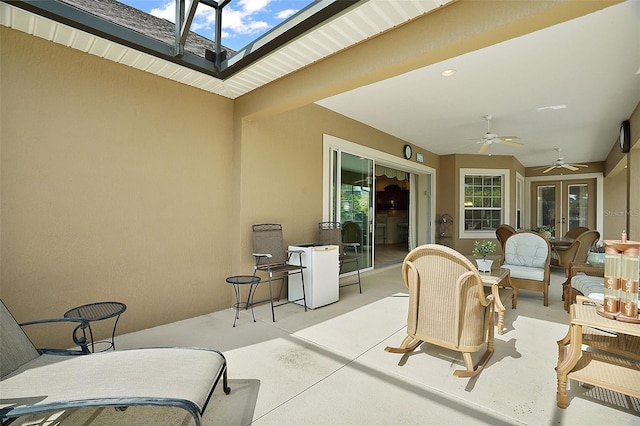 view of patio / terrace with french doors and ceiling fan