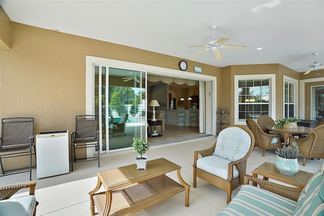 view of patio / terrace featuring ceiling fan