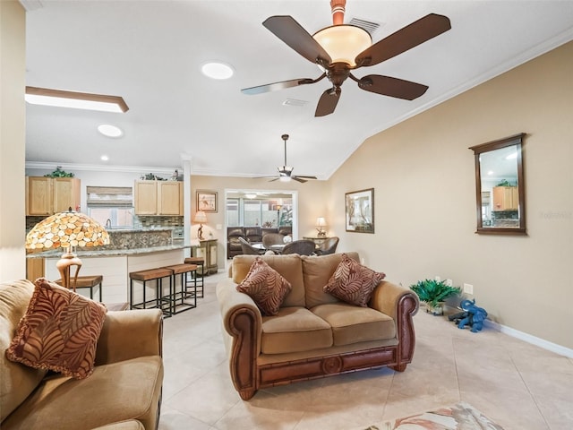 living room with crown molding, light tile patterned floors, and lofted ceiling