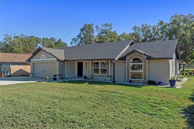 ranch-style home with a front lawn and a garage