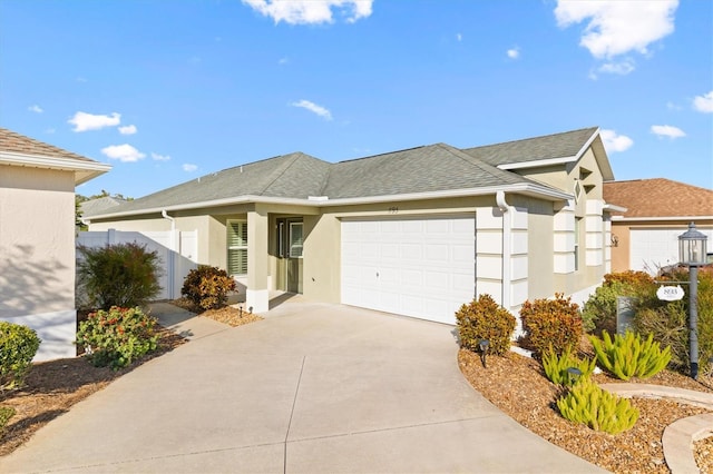 ranch-style house featuring a garage