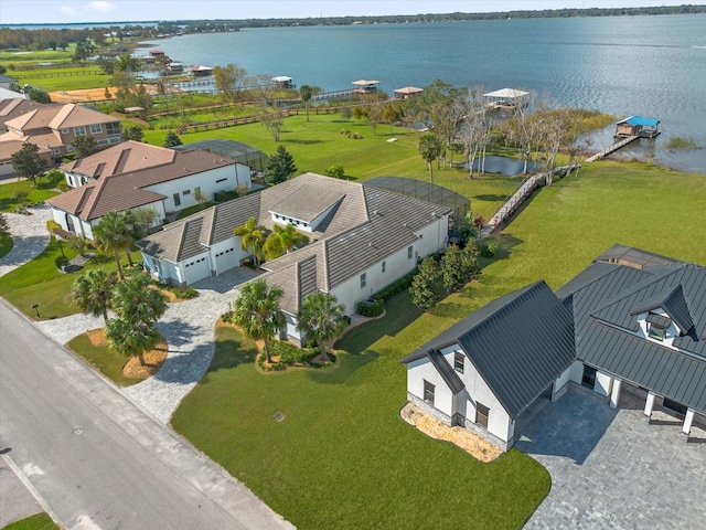 drone / aerial view with a water view