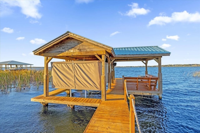 view of dock featuring a water view