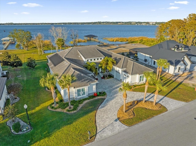 birds eye view of property featuring a water view