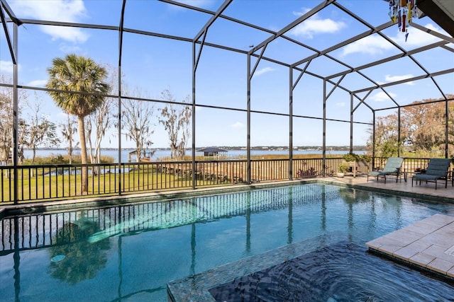 view of swimming pool with a water view, a lanai, and a patio