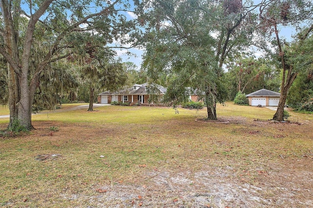 view of yard with a garage