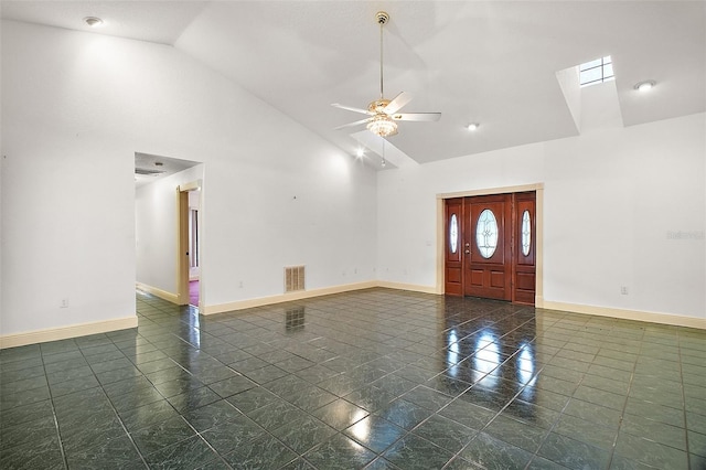 entryway with high vaulted ceiling and ceiling fan