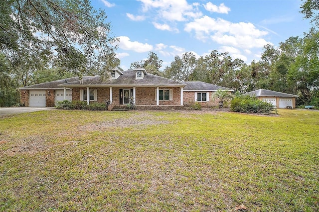 single story home with a front lawn and a garage