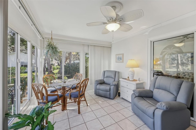 sunroom / solarium with ceiling fan