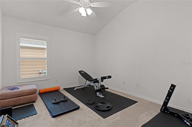 workout room featuring carpet flooring, ceiling fan, and vaulted ceiling