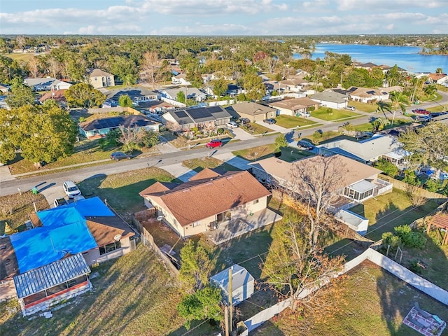 aerial view featuring a water view and a residential view