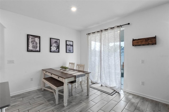 dining room with light hardwood / wood-style floors