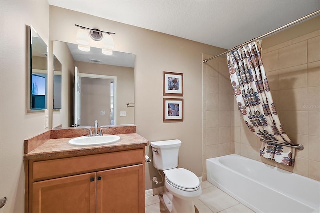 full bathroom with shower / tub combo, tile patterned floors, vanity, a textured ceiling, and toilet