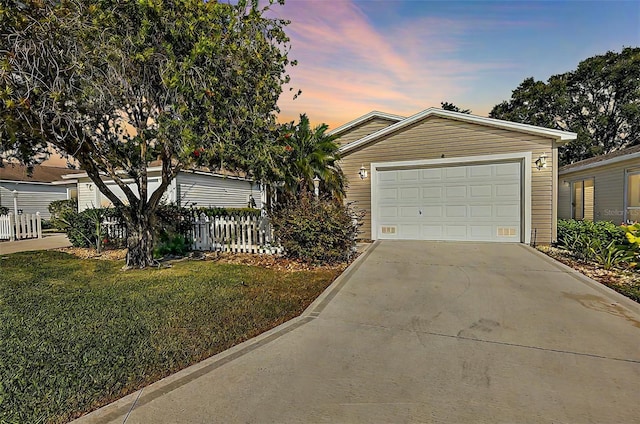 ranch-style house with a yard