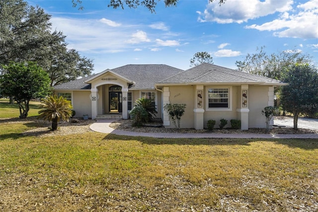 ranch-style house featuring a front yard