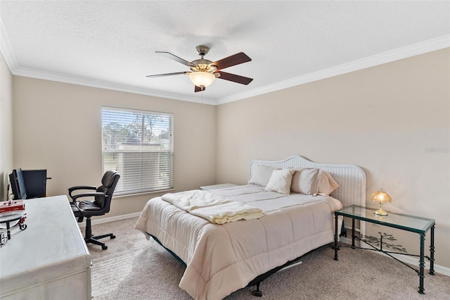 bedroom featuring a textured ceiling, carpet floors, ceiling fan, and ornamental molding