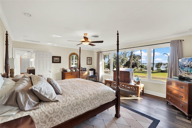 bedroom featuring ceiling fan, wood-type flooring, and crown molding