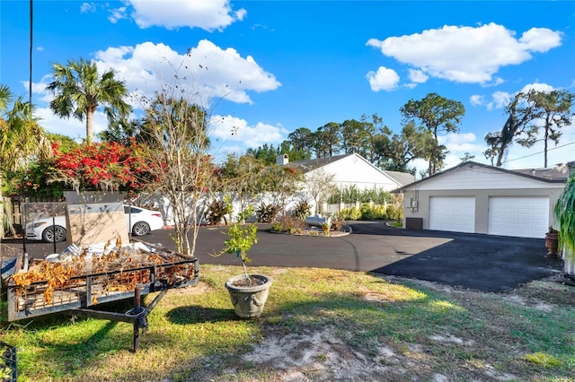 view of yard featuring a garage