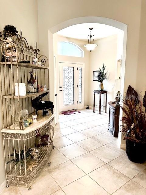 foyer entrance with tile patterned floors