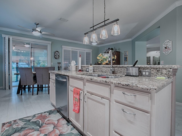 kitchen with dishwasher, a kitchen island with sink, crown molding, and sink