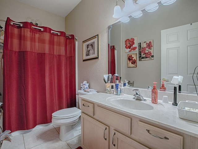 bathroom featuring tile patterned flooring, vanity, curtained shower, and toilet