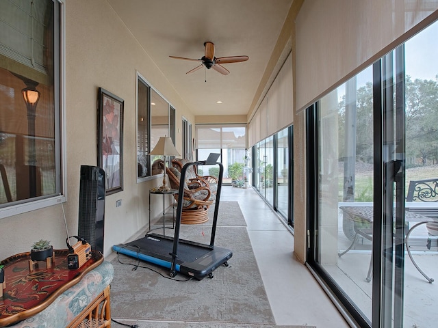 workout area featuring ceiling fan