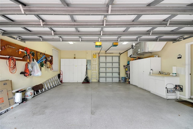 garage featuring a garage door opener and electric panel