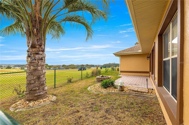 view of yard with a rural view