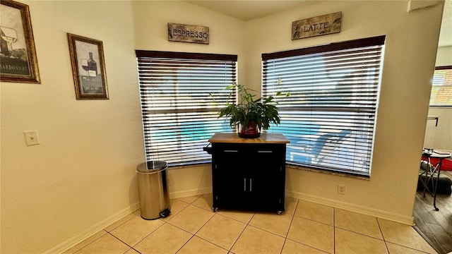 dining room with light tile patterned flooring