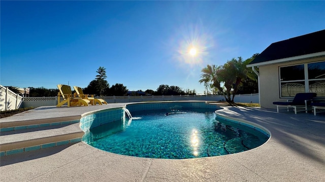 view of swimming pool featuring a patio area and pool water feature