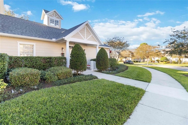 exterior space with a yard