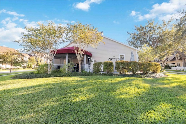 view of front of house featuring a front lawn