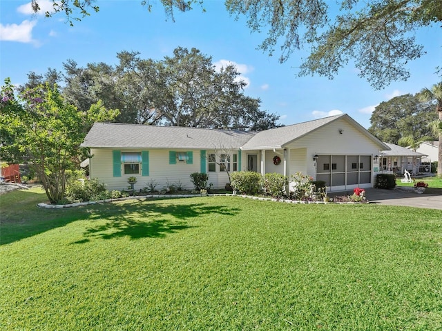 ranch-style house with a front lawn