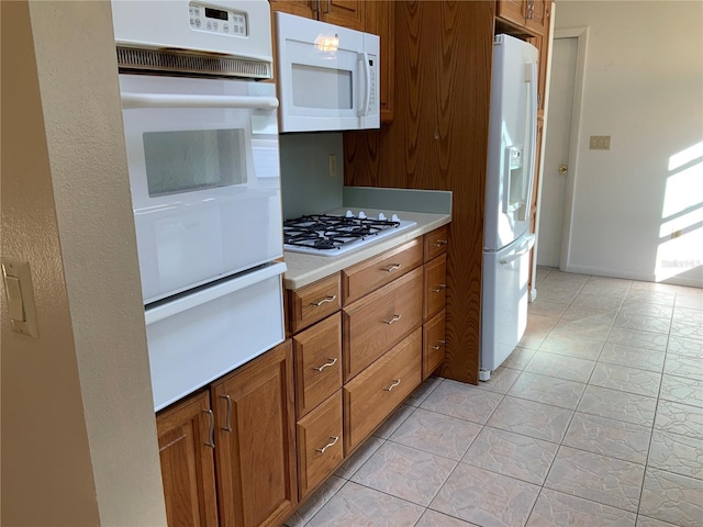 kitchen featuring white appliances