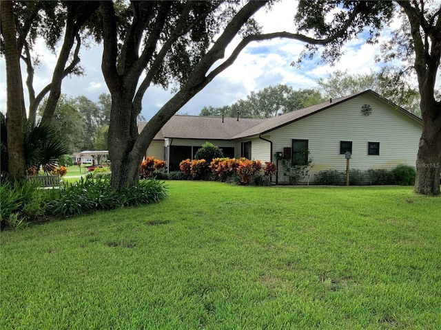 exterior space featuring a front yard