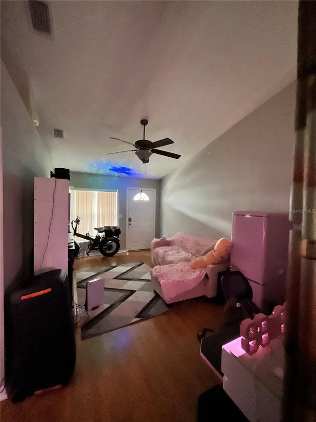 interior space featuring hardwood / wood-style flooring and ceiling fan