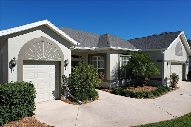 single story home featuring a garage