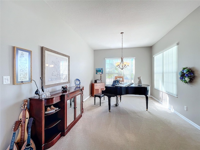 miscellaneous room featuring carpet, a textured ceiling, and an inviting chandelier