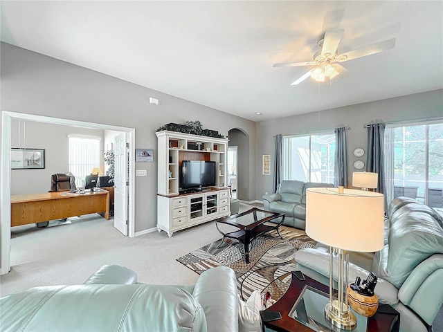 living room featuring ceiling fan and light carpet