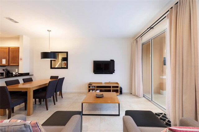 living room featuring light tile patterned flooring