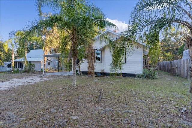 exterior space featuring a carport